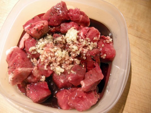 Lamb marinating in pomegranate syrup